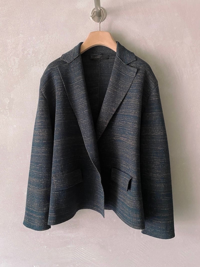 Giacca oversize in maglia di lana e lino colore verde con tasche a patta e revers classico, firmata Marina Lari.