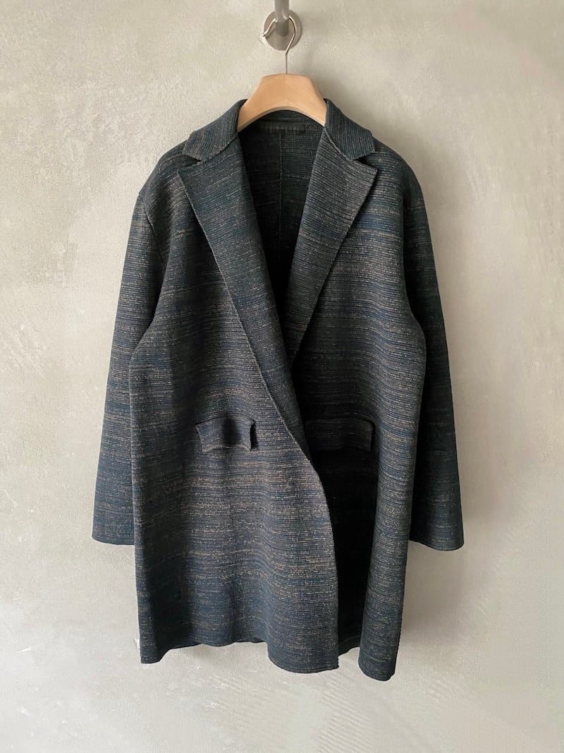 Saldi 86 Cappotto over in lana e lino verde melange con revers classico e tasche a patta, firmato Marina Lari Made in Italy.