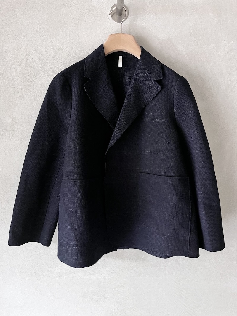 Giacca over Boboutic in maglia di cotone, lino e seta blu con lavorazione effetto stuoia e tasche applicate