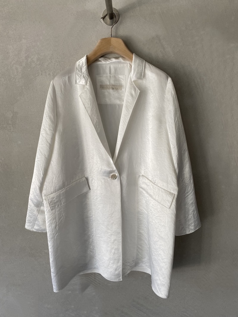Giacca bianca destrutturata in acetato con rever classici