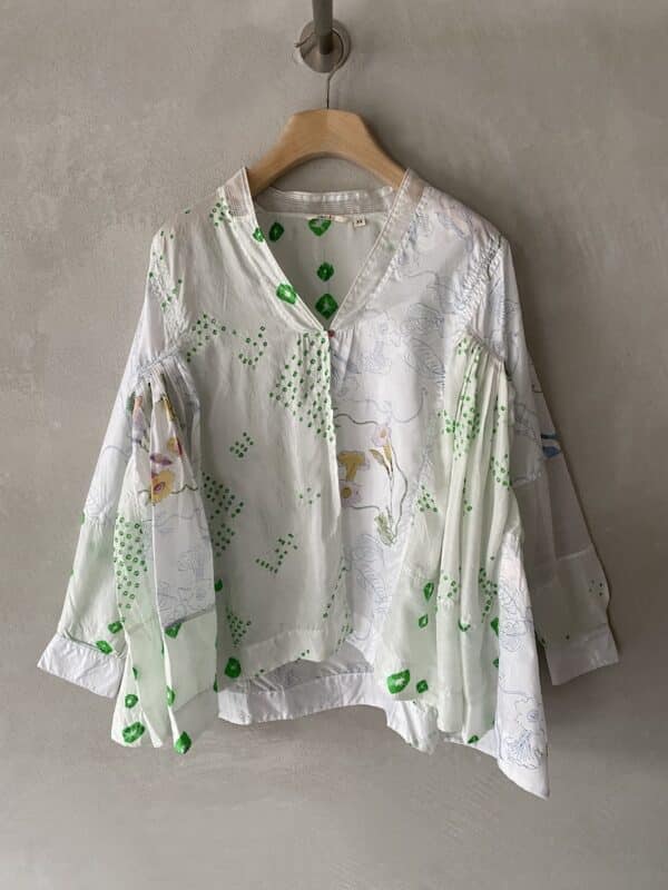 Patchwork silk shirt with hand-printed silk panels using the block print technique, collarless V-neck and long sleeves with block-print cuffs and buttons - INJIRI