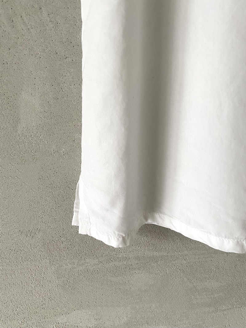 Top senza maniche in lyocell con scollo rotondo e linea svasata bianco – Barbara Tani