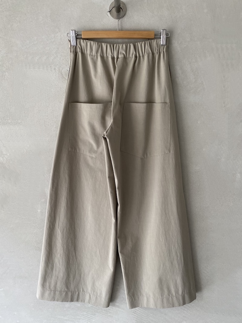 Marina Lari loose-fit trousers in beige linen and viscose.