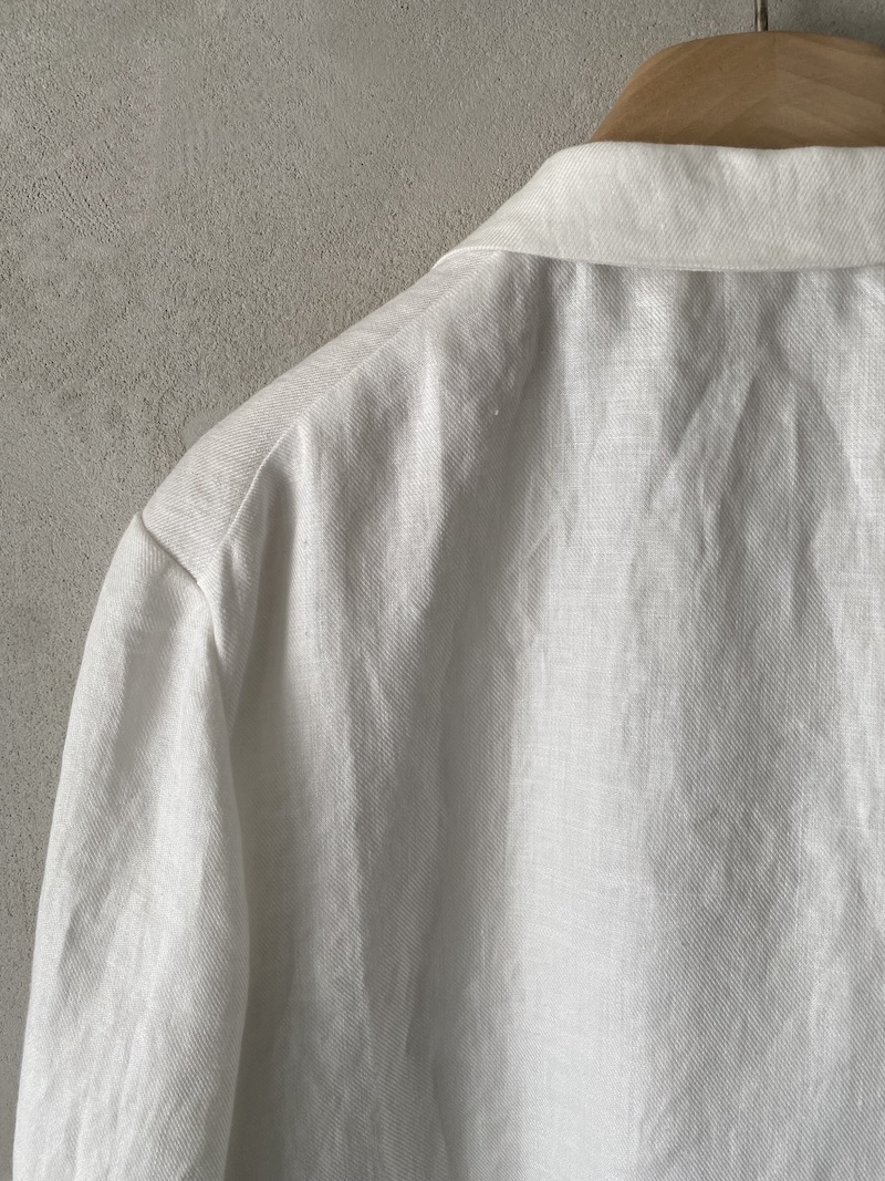 Marina Lari unlined oversized white linen jacket with notch lapels and one-button closure