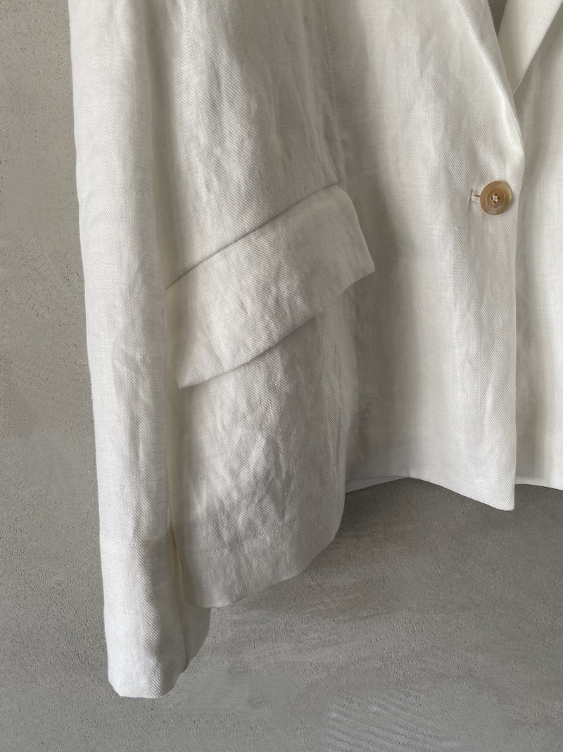 Marina Lari unlined oversized white linen jacket with notch lapels and one-button closure