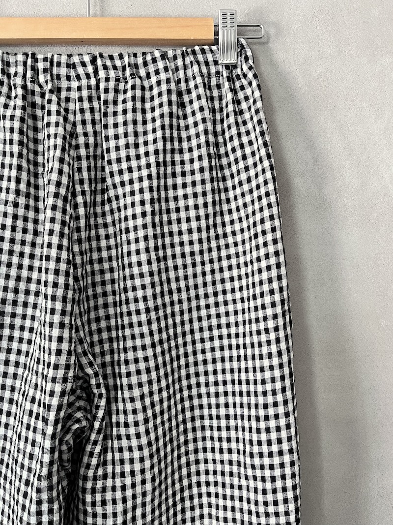 Pantaloni in lino vichy bianco e nero linea dritta con vita elasticizzata e tasche laterali Apuntob 1